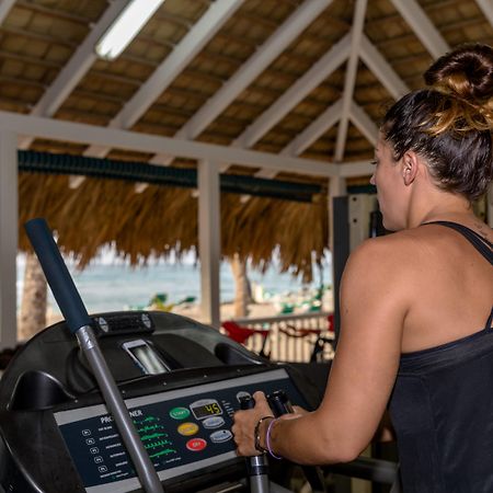 Playabachata Puerto Plata ภายนอก รูปภาพ A woman exercising on a treadmill
